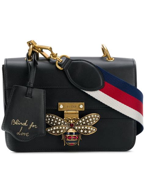 gucci black with white crossbody bee lock|Gucci clutch bag.